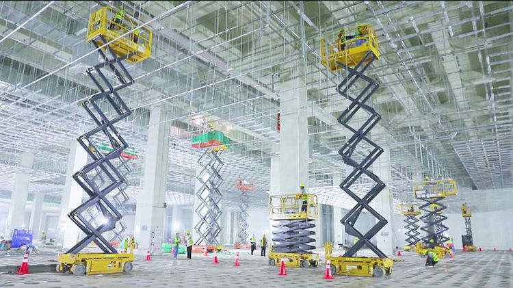 12m Elevatore elettrico a forbice con meccanismo di sollevamento e tavolo dimensione 2277x1120mm