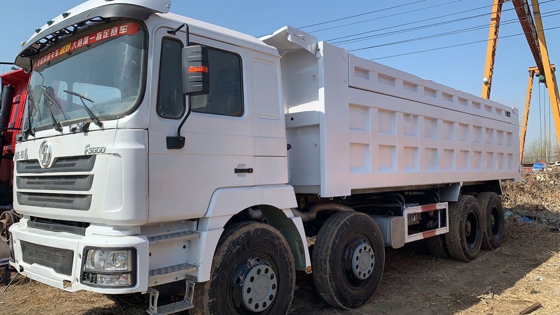 39000kg Peso di contenimento Shacman F3000 8x4 Camion a gomma Camion a scarico 6.2-8m Lunghezza del serbatoio di carico