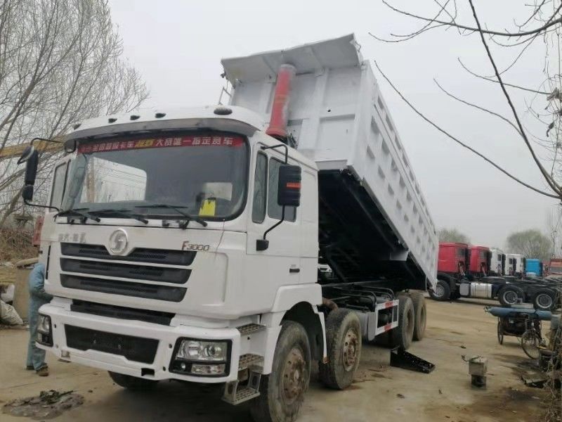 39000kg Peso di contenimento Shacman F3000 8x4 Camion a gomma Camion a scarico 6.2-8m Lunghezza del serbatoio di carico