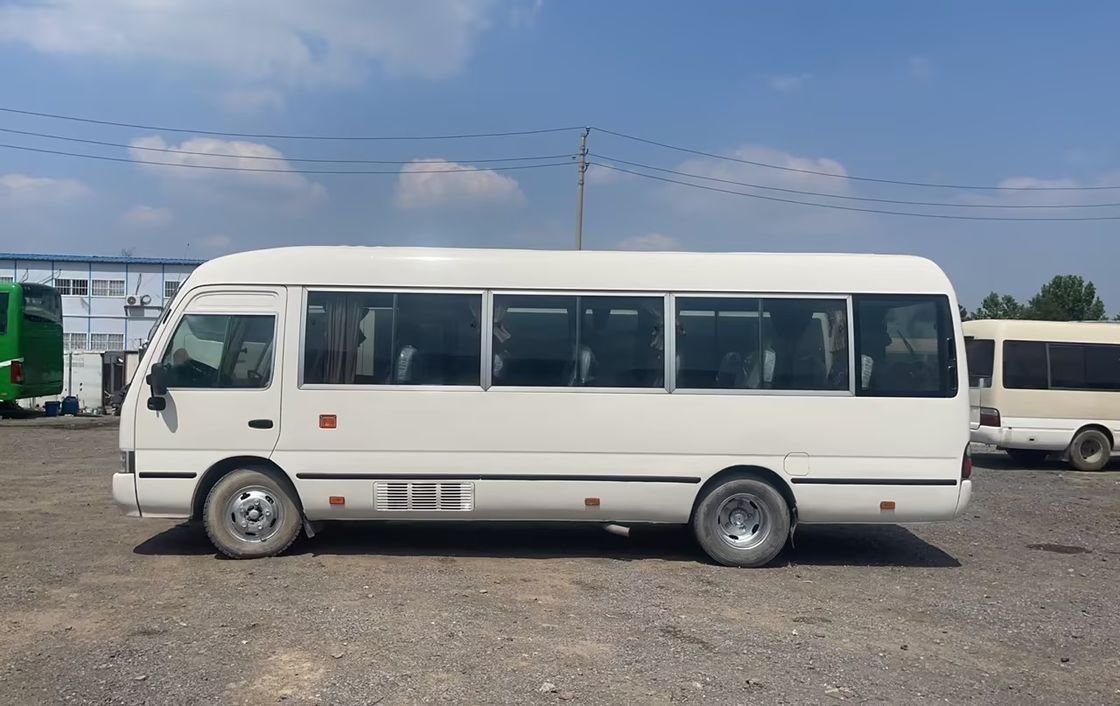 7m 30 posti Toyo Ta Coaster Motore dell'autobus Capacità 4L Dimensioni generali mm 7725x2000x2600