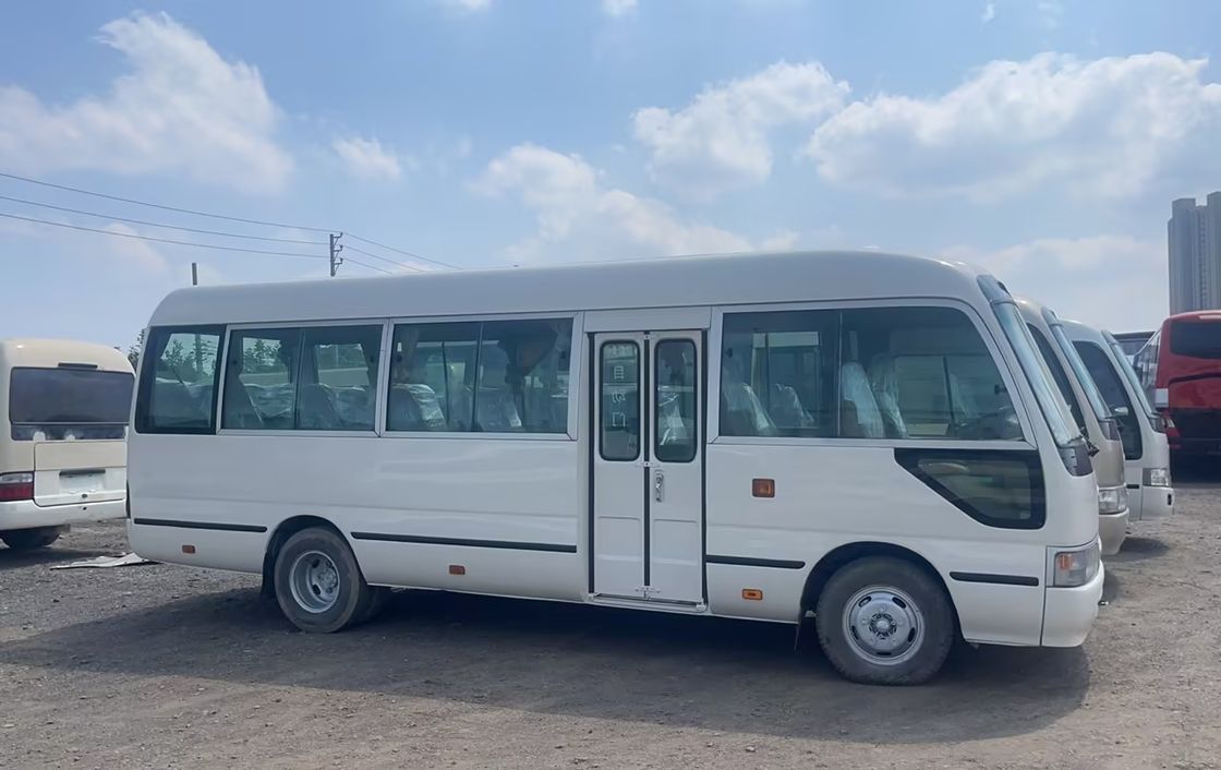 7m 30 posti Toyo Ta Coaster Motore dell'autobus Capacità 4L Dimensioni generali mm 7725x2000x2600