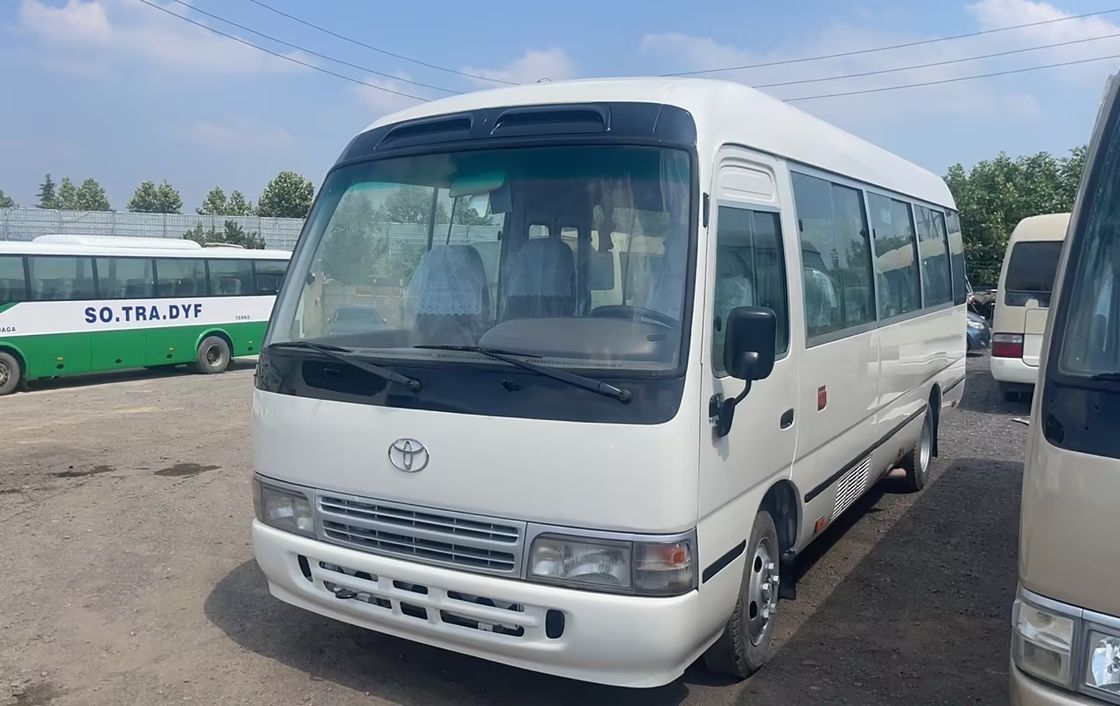 23-30 posti a sedere Used Toyota Coaster Bus con motore diesel a prezzi accessibili e capacità di posti a sedere