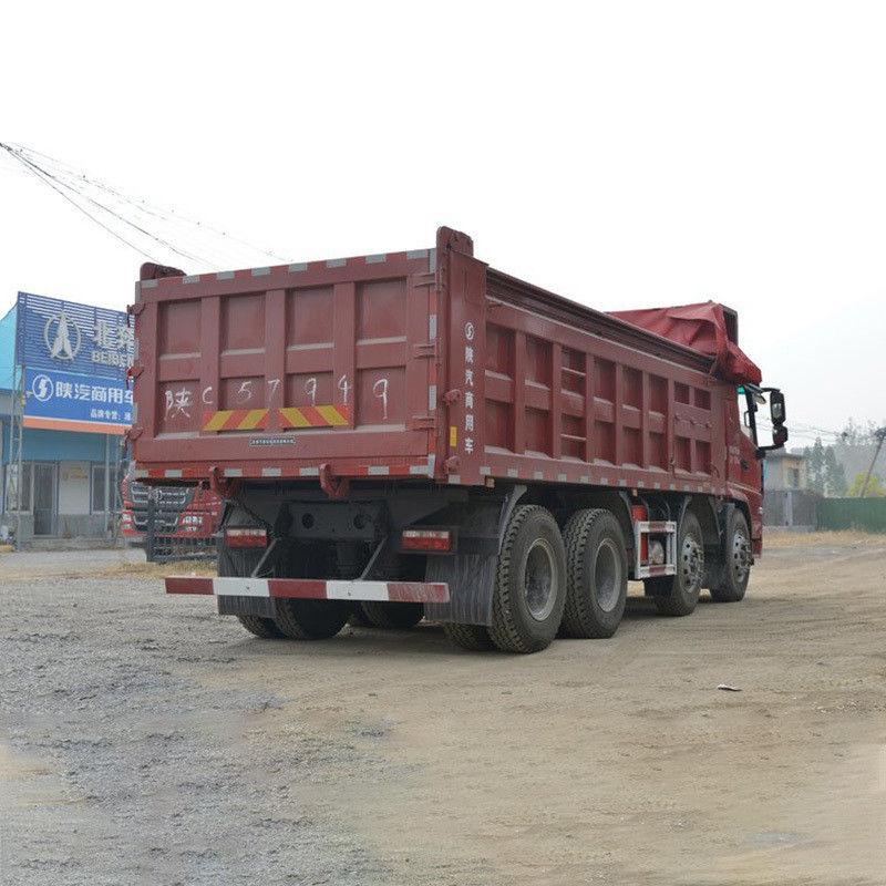 Shacman 8x4 12 ruote 8m3 24 metri cubi 30T bianca pesante usato camion di scarico in buone condizioni