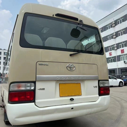 2023 Modello di Autobus Toyota Coaster a benzina 30 posti Capacità del motore 4L 7005*2040*2785mm