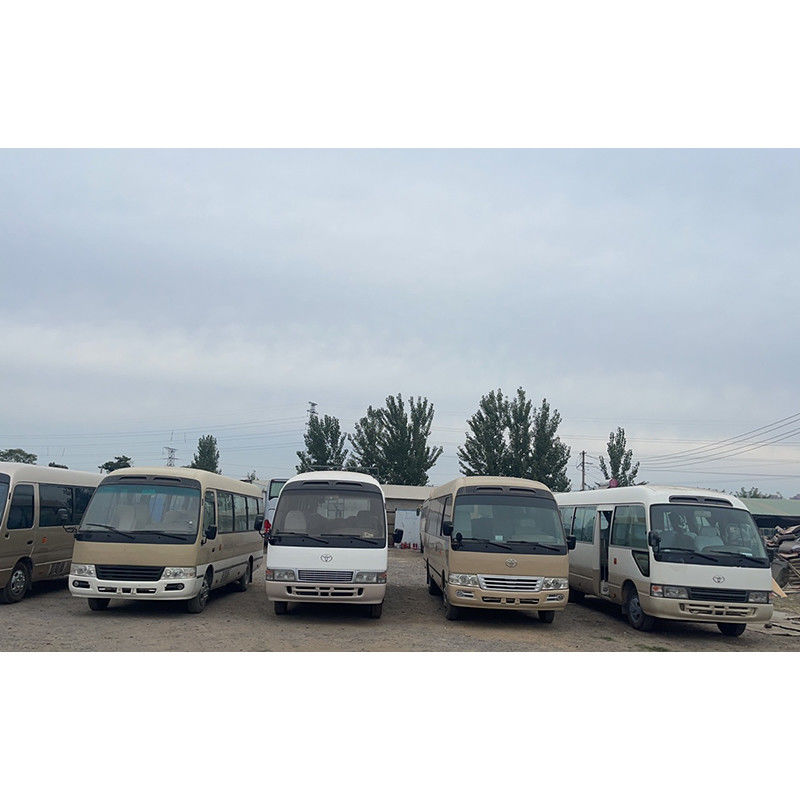 Minibus TOYO TA Coaster bianco per il turismo passeggeri