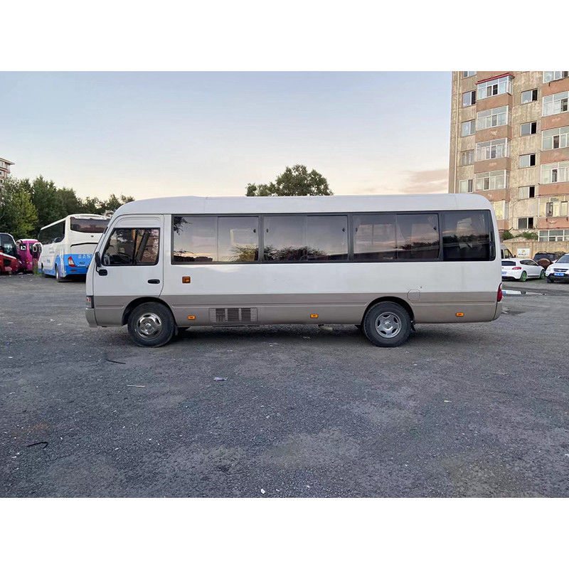Minibus TOYO TA Coaster bianco per il turismo passeggeri