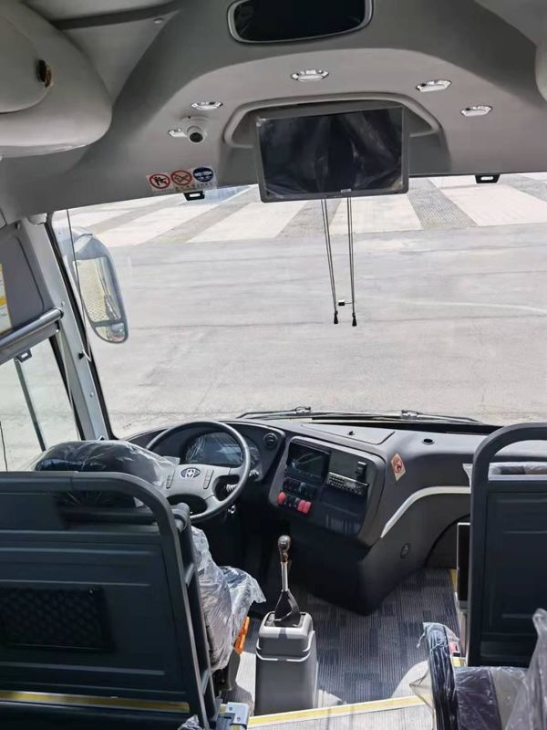 65 1 1 Capacità di posti a sedere Motore diesel Autobus turistico per l'Africa Progettazione e serbatoio di carburante da 600L
