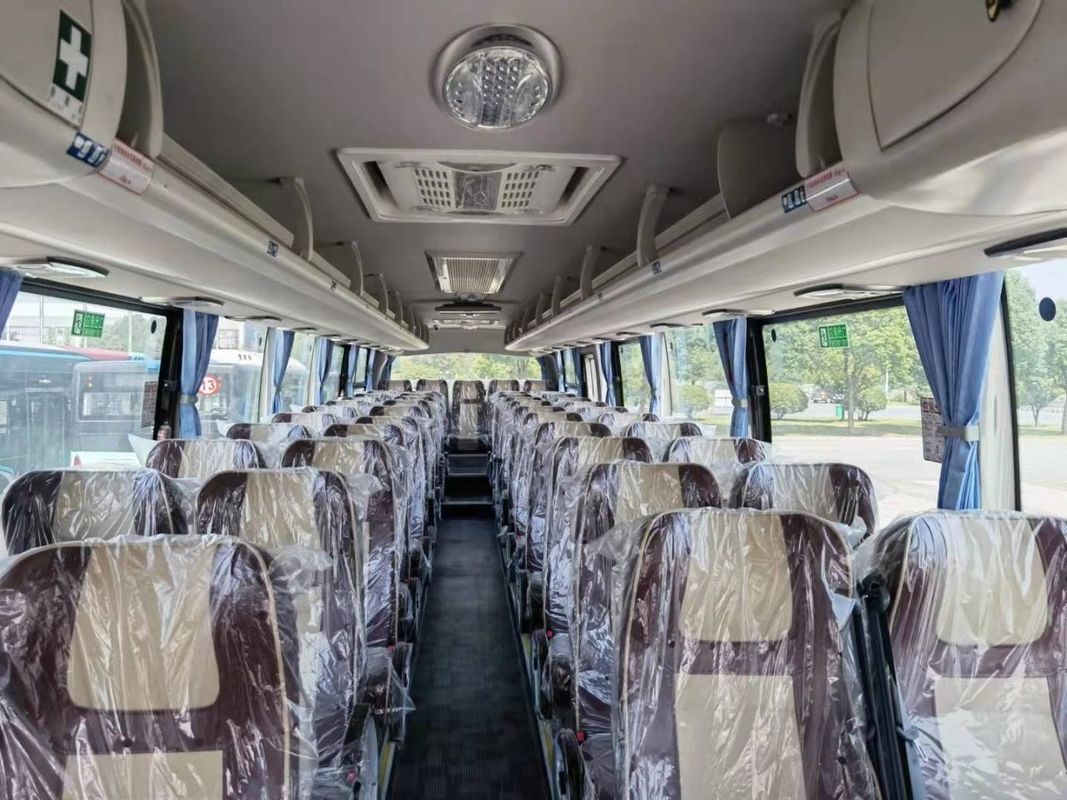 65 1 1 Capacità di posti a sedere Motore diesel Autobus turistico per l'Africa Progettazione e serbatoio di carburante da 600L